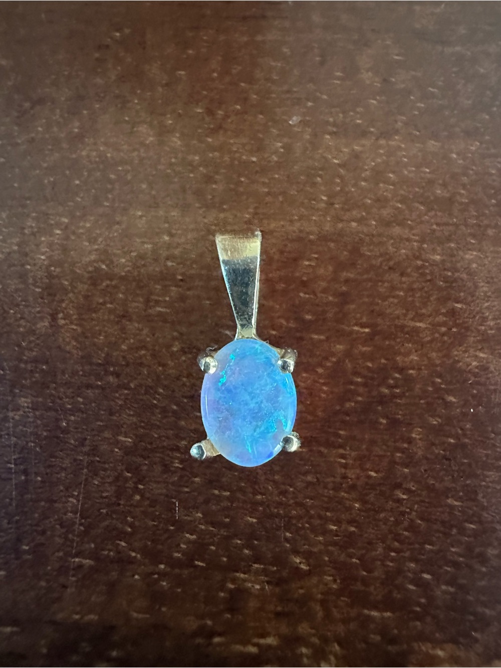 Oval Blue Opal Pendant in Silver Prong Setting